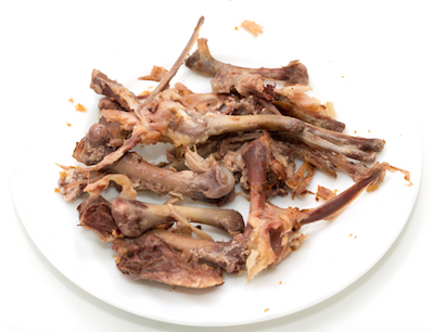 Animal bones from food on plate