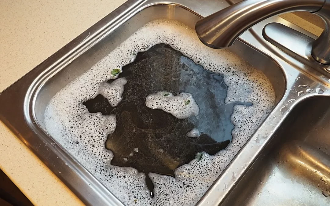Why Your Kitchen Sink Keeps Clogging in St. Charles County