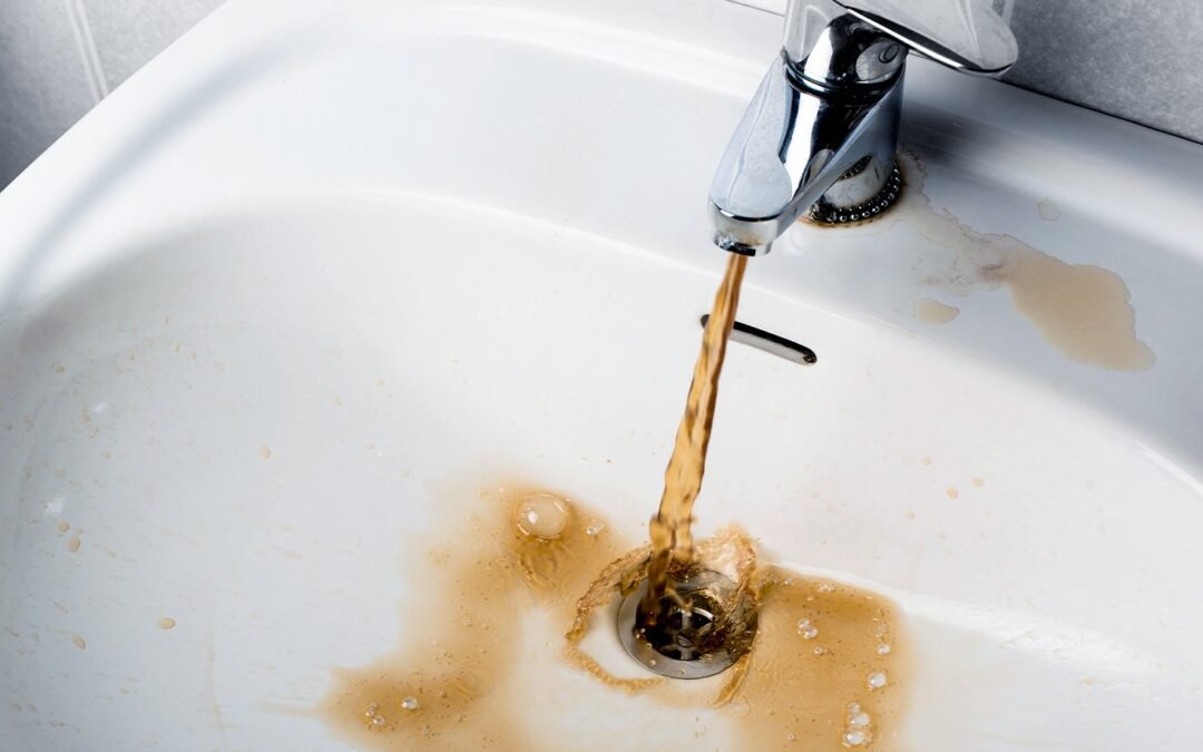 What Causes Rusty Water From a Hot Water Faucet?